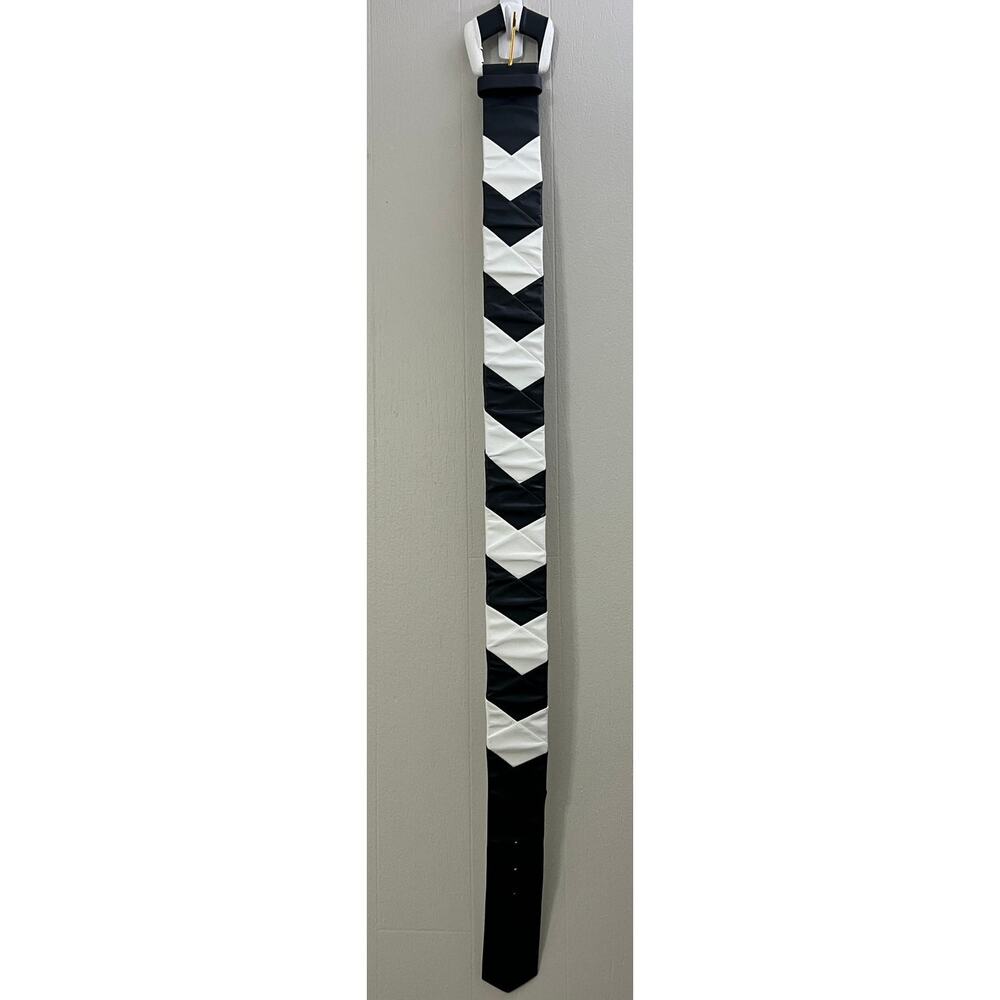 An Abbe Creation Vintage 80' Black and White Size Medium Chevron Leather Belt